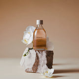 AROMATICA Mellowness Magnolia & Sandalwood Body Oil 100ml by ProtoClinical displayed in a polished skincare-style layout featuring the product packaging for a k-beauty body care routine.