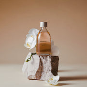 AROMATICA Mellowness Magnolia & Sandalwood Body Oil 100ml by ProtoClinical displayed in a polished skincare-style layout featuring the product packaging for a k-beauty body care routine.