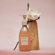 AROMATICA Mellowness Oil In Body Wash Magnolia & Sandalwood 290ml by ProtoClinical presented in a branded product detail graphic with body wash label details for a k-beauty body care routine.