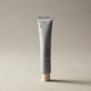 AROMATICA Tea Tree Balancing Toothpaste 100ml product packaging and tube on a light background