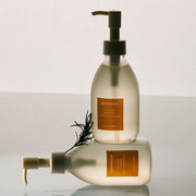AROMATICA Vitalizing Rosemary Pore Cleansing Oil 200ml by ProtoClinical displayed in a neat product presentation featuring the bottle packaging for a k-beauty skincare routine.