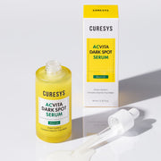 ProtoClinical k-beauty CURESYS Acvita Dark Spot Serum 30ml single upright serum package centered on a white background with pale yellow and olive tones