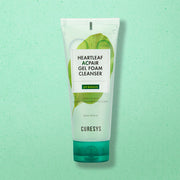 ProtoClinical k-beauty CURESYS Heartleaf Acpair Gel Foam Cleanser 150ml in a single upright mint-green cleanser tube on a soft aqua gradient background