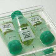 ProtoClinical k-beauty CURESYS Heartleaf Acpair Gel Foam Cleanser 150ml with three mint-green tubes arranged in a clear water tray, including one upside down