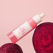 ProtoClinical k-beauty I'm from Beet Energy Ampoule 30ml single upright rose ampoule bottle centered on a blush pink background with a deep berry corner accent