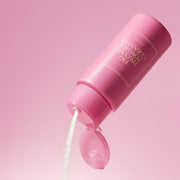 ProtoClinical k-beauty pink cosmetic product packaging on a light background.