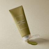 ProtoClinical k-beauty I'm from Mugwort Gel Cleanser 150ml single upright olive cleanser tube centered on a beige background.