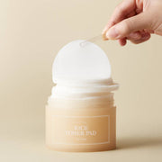 ProtoClinical k-beauty beige cosmetic product packaging on a light background.