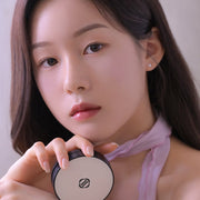 ProtoClinical k-beauty Dinto Blur-Finish Cushion 12g beauty graphic with a centered rounded compact form in a square crop on a light background.