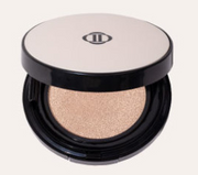 ProtoClinical k-beauty Dinto Blur-Finish Cushion 12g shown as a close-up compact with a rounded square case, dark lower half, and beige background