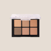 ProtoClinical k-beauty Dinto Blur-Finish Shadow 5.4g #702 Jelda Fitzgerald open six-pan eyeshadow palette on a pale beige background with peach, brown, and glitter shades