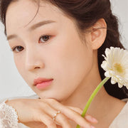 ProtoClinical k-beauty Dinto Blur-Finish Shadow 5.4g #704 Louisa May Alcott side-profile makeup look on a woman with warm brown eyeshadow, a neutral lip, and dark hair