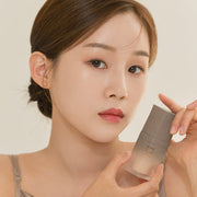 ProtoClinical k-beauty Dinto Wooncho Blur-Glowy Foundation 25ml single upright foundation bottle centered on a clean white background