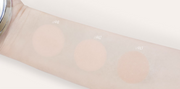ProtoClinical k-beauty abstract graphic with warm beige tones, a blurred taupe band across the center, and a soft peach highlight near the top edge