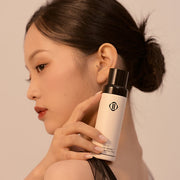 ProtoClinical k-beauty Dinto [Wooncho Collection] Last Makeup Fixer Matte 100ml single upright bottle centered on a white background with a muted beige body and darker cap