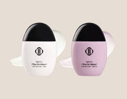 ProtoClinical k-beauty Dinto [Wooncho Collection] Last Sun Care SPF 50+PA++++ 50ml two upright rectangular packages side by side on a pale beige background.