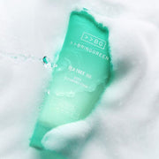 ProtoClinical k-beauty BRINGGREEN Tea Tree Cica Deep Cleansing Foam 120ml single upright mint-green cleansing foam package centered on a pale pink and gray background.