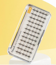 ProtoClinical k-beauty Fillimilli Point Piece Lashes (11mm)(60pcs) #Dolly Point false lash cluster set with dark lashes on a pale pink and cream background