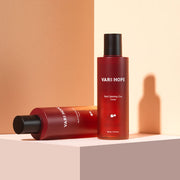 ProtoClinical k-beauty warm beige beauty product silhouette with a darker horizontal base on a soft peach background.