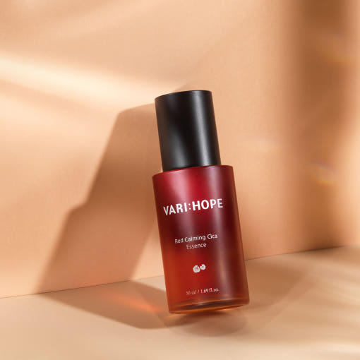 ProtoClinical k-beauty warm tan beauty product on a soft peach background.
