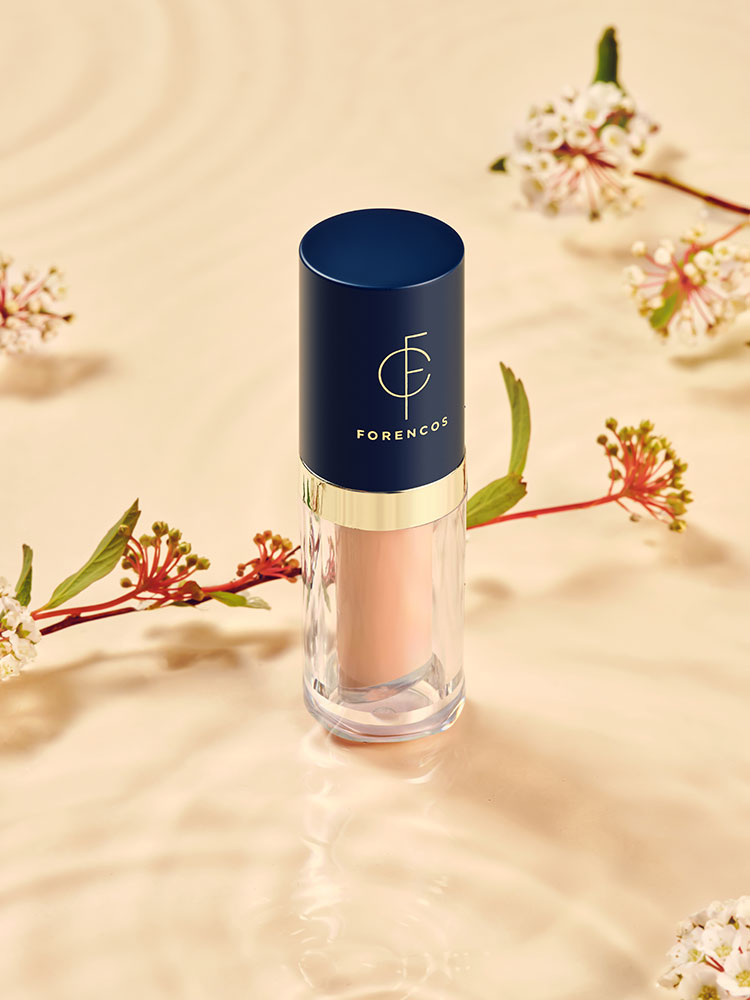 ProtoClinical k-beauty FORENCOS Tattoo Waterproof Scar Concealer 3g single upright concealer tube centered on a pale peach background