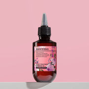 ProtoClinical k-beauty moremo Water Treatment Miracle 10 200ml (Blooming Edition) single upright dark rose treatment bottle centered on a pale pink background.