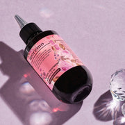ProtoClinical k-beauty moremo Water Treatment Miracle 10 200ml (Blooming Edition) single upright dark rose treatment bottle centered on a lavender background.
