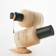 ProtoClinical k-beauty warm brown beauty product graphic with pale blue side accents on a light background.