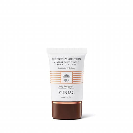 ProtoClinical k-beauty slim charcoal-toned product with soft peach side accents on a light background.