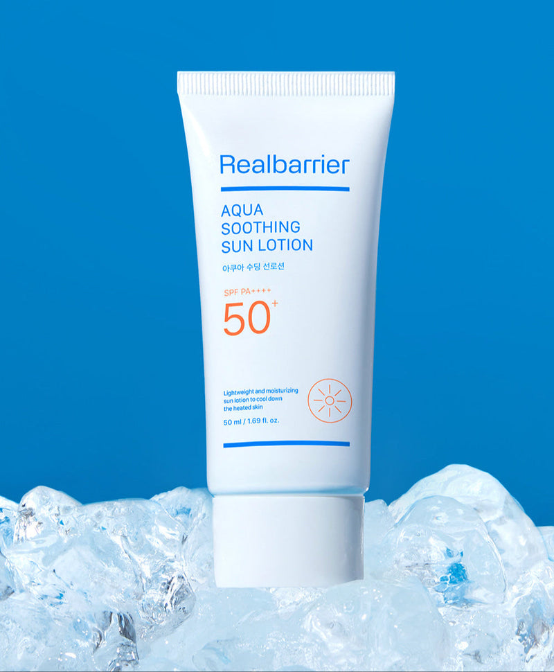 ProtoClinical k-beauty [Real Barrier] Aqua Soothing Sun Lotion SPF50+ PA++++ 50ml single upright white sun lotion tube on a bright blue background with a pale pink lower accent.