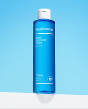 ProtoClinical k-beauty aqua beauty product silhouette with a bright white lower edge on a light blue background.
