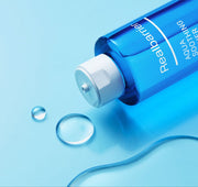 ProtoClinical k-beauty aqua beauty product silhouette with a dark teal vertical accent on a light blue background.