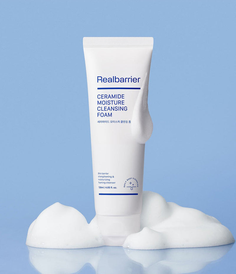 ProtoClinical k-beauty [Real Barrier] Ceramide Moisture Cleansing Foam 120ml single upright white cleansing foam tube on a cool blue background with soft gray lower shading.