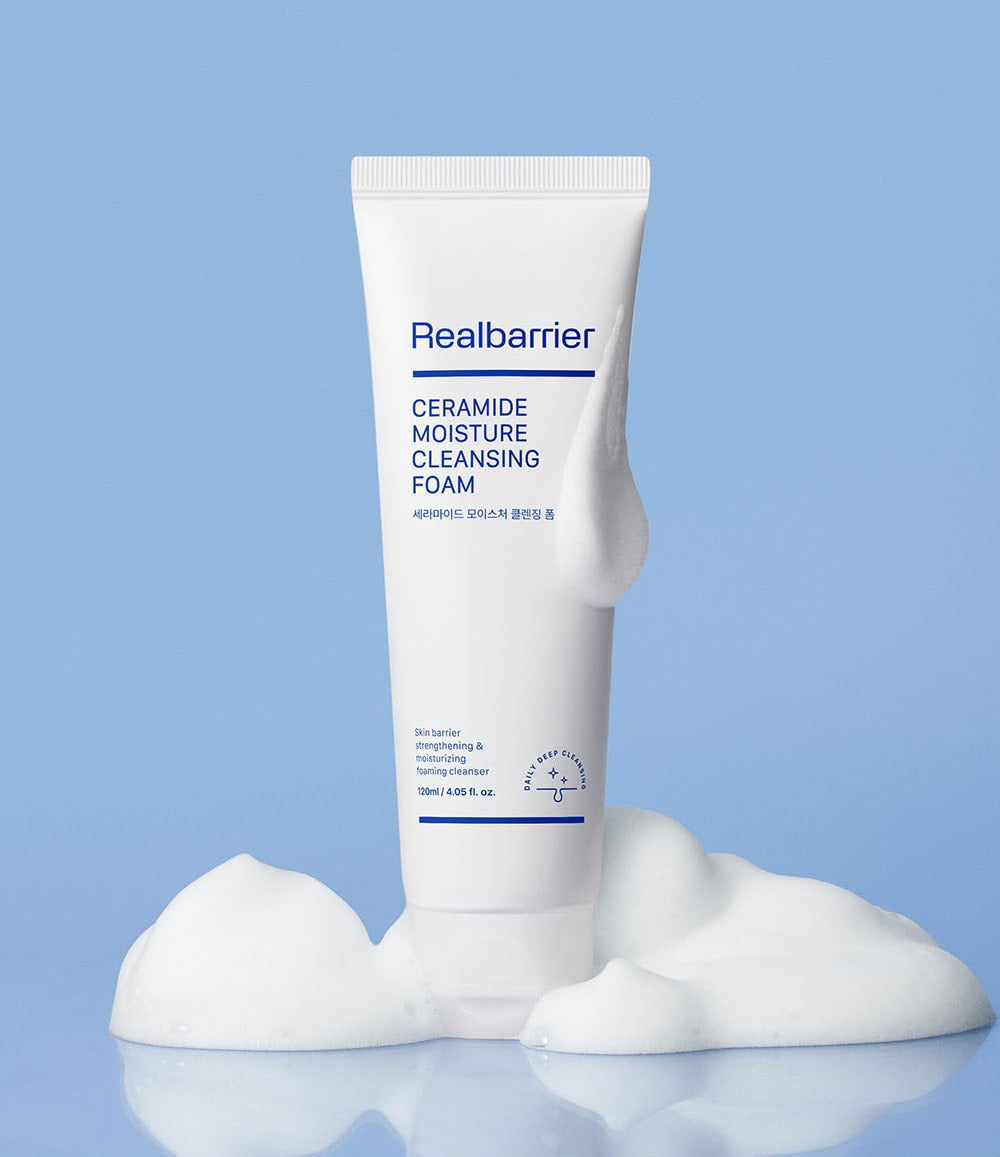 ProtoClinical k-beauty [Real Barrier] Ceramide Moisture Cleansing Foam 120ml single upright white cleansing foam tube on a cool blue background with soft gray lower shading.