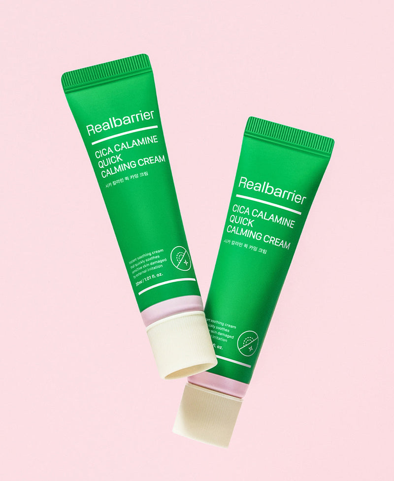 ProtoClinical k-beauty [Real Barrier] Cica Calamine Quick Calming Cream 30ml product graphic with a single upright green tube centered on soft pink side panels and a pale cream background
