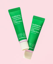 ProtoClinical k-beauty [Real Barrier] Cica Calamine Quick Calming Cream 30ml product graphic with a single upright green tube centered on soft pink side panels and a pale cream background