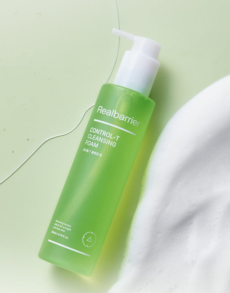 ProtoClinical k-beauty [Real Barrier] Control-T Cleansing Foam 200ml single upright green cleansing foam package on a pale green background with soft pink side accents.