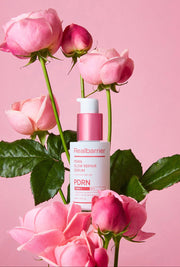 ProtoClinical k-beauty [Real Barrier] PDRN Glow Repair Serum 30ml packaging with pink and beige horizontal bands on a soft pink background.