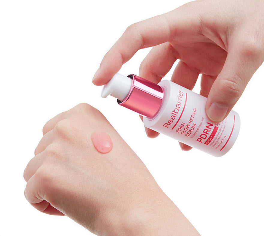 ProtoClinical k-beauty [Real Barrier] PDRN Glow Repair Serum 30ml packaging with soft pink and beige tones and a warm brown center on a light background.