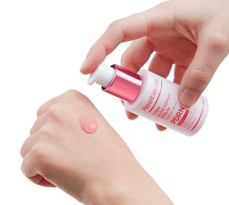 ProtoClinical k-beauty [Real Barrier] PDRN Glow Repair Serum 30ml packaging with soft pink and beige tones and a warm brown center on a light background.