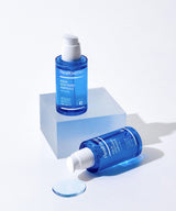 ProtoClinical k-beauty beauty product silhouette with a blue vertical center on a warm off-white background.