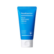 ProtoClinical k-beauty [Real Barrier] Aqua Soothing Cream [Tube] 75ml shown as a single blue tube silhouette centered on a light background with soft warm peach accents