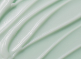 ProtoClinical k-beauty abstract beauty graphic with muted sage green tones on a light background.