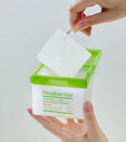 ProtoClinical k-beauty [Real Barrier] CONTROL-T Acid Quick Boosting Pad 210ml/100pads packaging with green horizontal bands and soft pink accents on a light background.