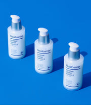 ProtoClinical k-beauty abstract beauty graphic with soft blue columns on a vivid blue background.