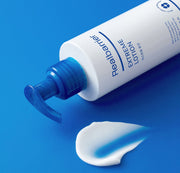 ProtoClinical k-beauty abstract beauty graphic with bright blue tones and a dark blue horizontal band.