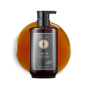 ProtoClinical k-beauty [Daeng Gi Meo Ri] Ki Gold Shampoo 500ml shown as a single rounded shampoo bottle with a brown center, pale peach side accents, and a light background