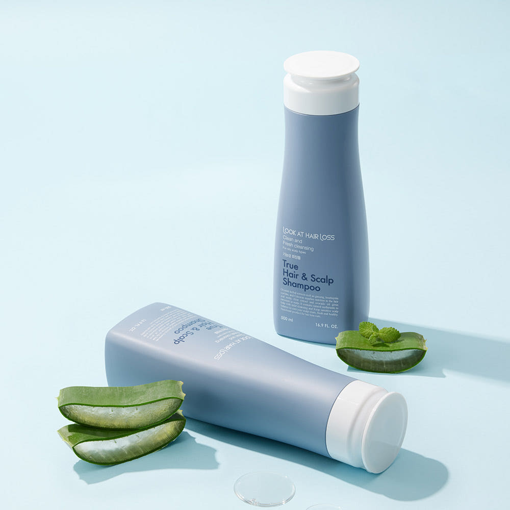 ProtoClinical k-beauty abstract graphic with pale aqua and blue tones, a blurred slate-blue vertical shape in the center, and a muted green band across the lower left