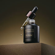 ProtoClinical k-beauty dark brown beauty product packaging on a clean white background.