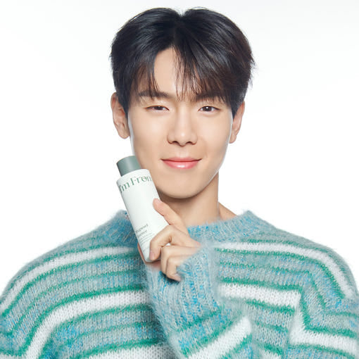 ProtoClinical k-beauty beauty graphic with a dark brown top, pale center, and soft blue lower band.